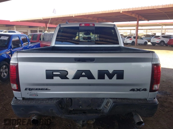 2017 Ram 1500 Rebel z VIN 1C6RR7YT9HS595619, wystawiony jako IAAI lot #41892988 z przebiegiem 115 388 mil mil oraz . Historia ofert i sprzedaży dostępna na DreamBid. Obrazek 16.