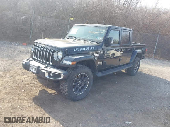 2021 Jeep Gladiator Overland z VIN 1C6HJTFG1ML606215, wystawiony jako IAAI lot #41771646 z przebiegiem 77 411 mil mil oraz . Historia ofert i sprzedaży dostępna na DreamBid. Obrazek 2.