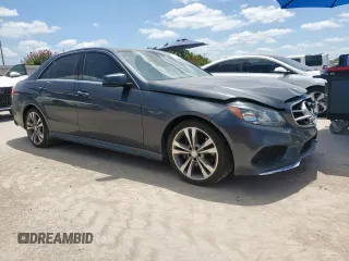 2014 Mercedes-Benz E 350 Luxury with VIN WDDHF8JB2EA904410, listed as a Copart auction lot 65151415 with 158,946 mi miles and Salvage title. Bid and sale history available at DreamBid. Image 4.