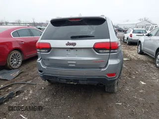 2021 Jeep Grand Cherokee Trailhawk with VIN 1C4RJFLG2MC579884, listed as a IAAI auction lot 41526769 with 115,461 mi miles. Bid and sale history available at carsss.com. Image 17.