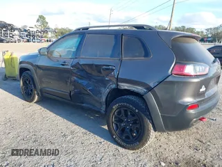 2019 Jeep Cherokee Trailhawk with VIN 1C4PJMBX3KD246100, listed as a IAAI auction lot 41191581 with 98,124 mi miles and . Bid and sale history available at DreamBid. Image 3.