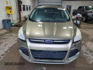 2013 Ford Escape SE z VIN 1FMCU9GX0DUA43966, wystawiony jako Copart lot #66152725 z przebiegiem 122 498 mil mil oraz Czysty tytuł • Clean title. Historia ofert i sprzedaży dostępna na DreamBid. Obrazek 5.