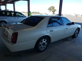 2003 Cadillac DeVille with VIN 1G6KD54Y83U252542, listed as a IAAI auction lot 40646979 with 131,202 mi miles. Bid and sale history available at carsss.com. Image 4.
