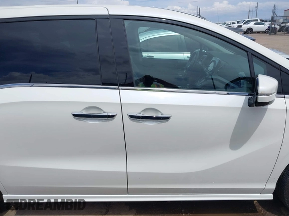 2019 Honda Odyssey Elite z VIN 5FNRL6H91KB110452, wystawiony jako IAAI lot #42630514 z przebiegiem 64 349 mil mil oraz . Historia ofert i sprzedaży dostępna na DreamBid. Obrazek 13.