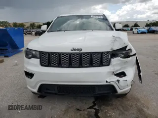 2019 Jeep Grand Cherokee Laredo E with VIN 1C4RJEAG4KC816725, listed as a Copart auction lot 64466815 with 84,763 mi miles and Salvage title. Bid and sale history available at DreamBid. Image 5.