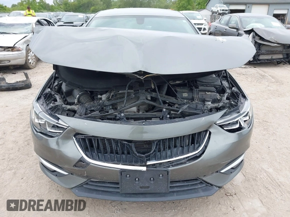 2019 Buick Regal Essence with VIN W04GP6SX6K1009087, listed as a IAAI auction lot 42318056 with 67,460 mi miles and . Bid and sale history available at DreamBid. Image 6.