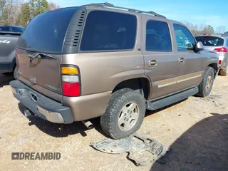 2004 Chevrolet Tahoe LS with VIN 1GNEK13Z34R304352, listed as a IAAI auction lot 41565612 with 291,777 mi miles. Bid and sale history available at carsss.com. Image 4.