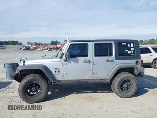 2007 Jeep Wrangler Unlimited X with VIN 1J4GB39147L199367, listed as a IAAI auction lot 40897772 with 229,309 mi miles and . Bid and sale history available at DreamBid. Image 14.