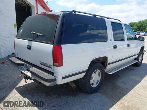 1999 Chevrolet Suburban z VIN 3GNFK16R1XG165083, wystawiony jako IAAI lot #42137129 z przebiegiem 209 137 mil mil oraz . Historia ofert i sprzedaży dostępna na DreamBid. Obrazek 4.