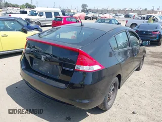 2010 Honda Insight LX with VIN JHMZE2H50AS014165, listed as a IAAI auction lot 42381535 with 169,032 mi miles and . Bid and sale history available at DreamBid. Image 4.