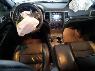 2014 Jeep Grand Cherokee Overland with VIN 1C4RJFCG7EC209452, listed as a Copart auction lot 88752795 with 102,725 mi miles and Salvage Title. Bid and sale history available at carsss.com. Image 8.