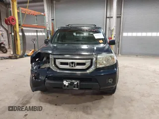 2011 Honda Pilot EX-L with VIN 5FNYF4H52BB038651, listed as a IAAI auction lot 41868695 with 281,683 mi miles. Bid and sale history available at carsss.com. Image 12.