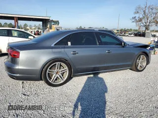 2015 Audi A8 L 4.0T with VIN WAU32AFD4FN041442, listed as a Copart auction lot 43708295 with 132,579 mi miles and Salvage Title. Bid and sale history available at carsss.com. Image 3.