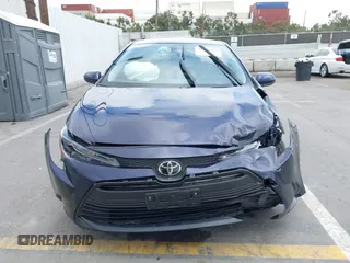 2023 Toyota Corolla LE with VIN JTDB4MEE5PJ006860, listed as a IAAI auction lot 41787964 with 18,883 mi miles. Bid and sale history available at carsss.com. Image 6.