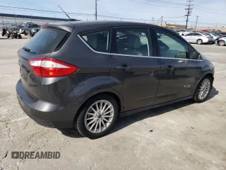 2015 Ford C-Max Energi SEL with VIN 1FADP5CU0FL115641, listed as a Copart auction lot 46487404 with 97,970 mi miles. Bid and sale history available at carsss.com. Image 3.