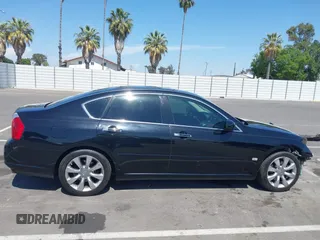 2007 Infiniti M Sport z VIN JNKAY01E17M312062, wystawiony jako IAAI lot #42356818 z przebiegiem 172 780 mil mil oraz . Historia ofert i sprzedaży dostępna na DreamBid. Obrazek 13.