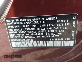2013 Volkswagen Passat SE w/Sunroof with VIN 1VWBH7A35DC150285, listed as a IAAI auction lot 38970420 with 160,374 mi miles. Bid and sale history available at carsss.com. Image 9.