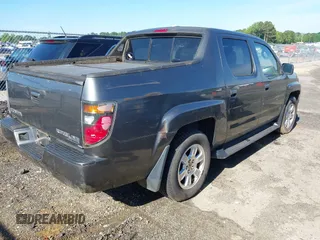 2008 Honda Ridgeline RTL z VIN 2HJYK16518H518451, wystawiony jako IAAI lot #42332723 z przebiegiem 295 375 mil mil oraz . Historia ofert i sprzedaży dostępna na DreamBid. Obrazek 4.