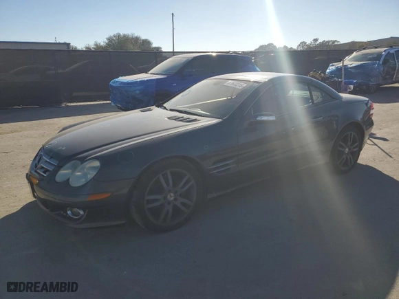 2008 Mercedes-Benz SL-Class V8 with VIN WDBSK71F98F141543, listed as a Copart auction lot 87600215 with 0 mi miles and Salvage Title. Bid and sale history available at carsss.com. Image 1.