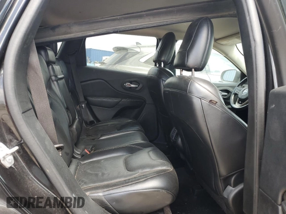 2016 Jeep Cherokee Limited with VIN 1C4PJLDB0GW287372, listed as a Copart auction lot 52795535 with 173,038 mi miles and Salvage title. Bid and sale history available at DreamBid. Image 11.