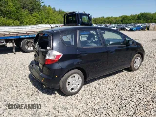 2013 Honda Fit с VIN JHMGE8H3XDC034270, выставлен на аукционе Copart как лот 57486305 с пробегом 92 093 миль миль и Списание • Salvage title. История ставок и продаж доступна на DreamBid. Изображение 3.