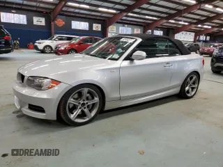 2011 BMW 1 Series 135i with VIN WBAUN7C5XBVM24033, listed as a Copart auction lot 82958274 with 91,726 mi miles and Clean Title. Bid and sale history available at DreamBid. Image 1.