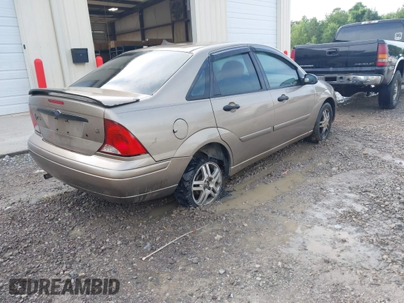 2004 Ford Focus SE with VIN 1FAFP343X4W156745, listed as a IAAI auction lot 42501461 with 289,925 mi miles and . Bid and sale history available at DreamBid. Image 4.
