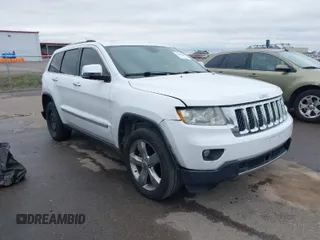 2013 Jeep Grand Cherokee Overland with VIN 1C4RJECG3DC620873, listed as a IAAI auction lot 40909601 with 195,374 mi miles. Bid and sale history available at carsss.com. Image 1.