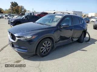 2018 Mazda CX-5 Touring with VIN JM3KFACM6J1323449, listed as a Copart auction lot 54090445 with 93,748 mi miles and Salvage Title. Bid and sale history available at carsss.com. Image 1.