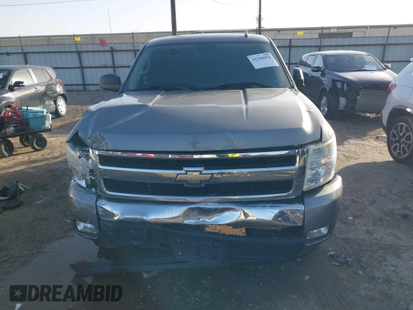 2007 Chevrolet Silverado 1500 1LT with VIN 1GCEK14097Z541862, listed as a IAAI auction lot 41360063 with 122,678 mi miles and . Bid and sale history available at DreamBid. Image 12.