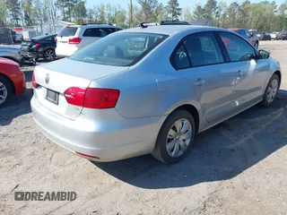 2014 Volkswagen Jetta Sedan SE with VIN 3VWD17AJ3EM362999, listed as a IAAI auction lot 41978737 with 121,178 mi miles. Bid and sale history available at carsss.com. Image 4.