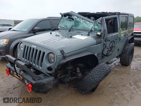 2014 Jeep Wrangler Unlimited Sport with VIN 1C4BJWDG1EL135073, listed as a IAAI auction lot 42435361 with 129,144 mi miles and . Bid and sale history available at DreamBid. Image 6.