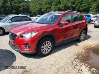 2016 Mazda CX-5 Touring с VIN JM3KE2CY2G0871541, выставлен на аукционе Copart как лот 62562505 с пробегом 91 491 миль миль и Списание • Salvage title. История ставок и продаж доступна на DreamBid. Изображение 1.