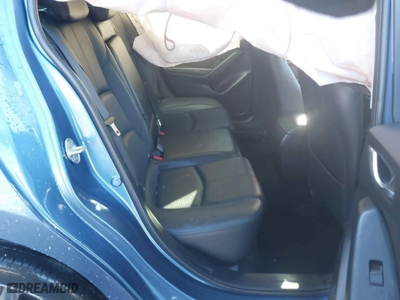 2018 Mazda Mazda3 4-Door Grand Touring with VIN 3MZBN1W38JM179689, listed as a IAAI auction lot 41305303 with 77,277 mi miles. Bid and sale history available at carsss.com. Image 8.