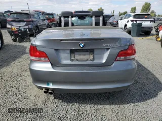 2009 BMW 1 Series 128i with VIN WBAUL73509VJ76763, listed as a Copart auction lot 66763214 with 83,954 mi miles and Salvage Title. Bid and sale history available at DreamBid. Image 6.