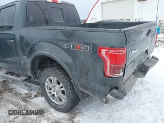 2015 Ford F-150 XLT with VIN 1FTEW1EP6FFB48630, listed as a IAAI auction lot 41597442 with 128,428 mi miles. Bid and sale history available at carsss.com. Image 6.