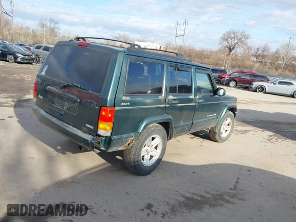 2000 Jeep Cherokee Classic with VIN 1J4FF58S6YL105920, listed as a IAAI auction lot 41497047 with 192,410 mi miles. Bid and sale history available at carsss.com. Image 4.