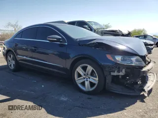 2013 Volkswagen CC Sport Plus z VIN WVWBP7AN4DE569787, wystawiony jako Copart lot #57450665 z przebiegiem 92 826 mil mil oraz Szkody całkowita. Historia ofert i sprzedaży dostępna na DreamBid. Obrazek 4.