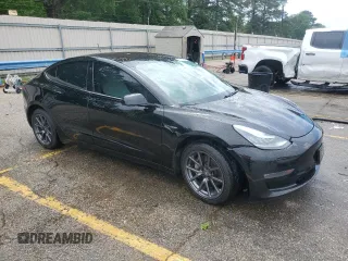 2019 Tesla Model 3 Mid Range z VIN 5YJ3E1EA5KF301714, wystawiony jako Copart lot #55273595 z przebiegiem Nie podano mil oraz Szkoda całkowita • Salvage title. Historia ofert i sprzedaży dostępna na DreamBid. Obrazek 4.