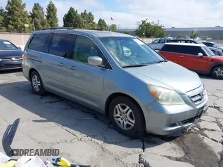 2005 Honda Odyssey EX-L z VIN 5FNRL38625B071315, wystawiony jako IAAI lot #42523399 z przebiegiem 245 618 mil mil oraz . Historia ofert i sprzedaży dostępna na DreamBid. Obrazek 1.