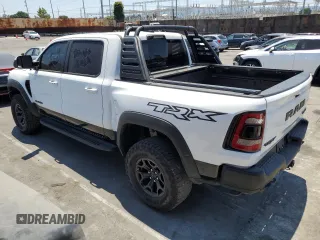 2022 Ram 1500 TRX with VIN 1C6SRFU9XNN215610, listed as a Copart auction lot 59362484 with 23,904 mi miles and Salvage title. Bid and sale history available at DreamBid. Image 2.