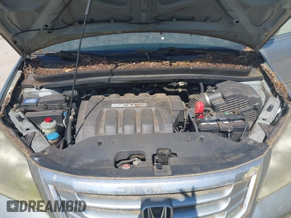 2008 Honda Odyssey EX with VIN 5FNRL38498B067068, listed as a IAAI auction lot 42041658 with 161,953 mi miles and . Bid and sale history available at DreamBid. Image 10.