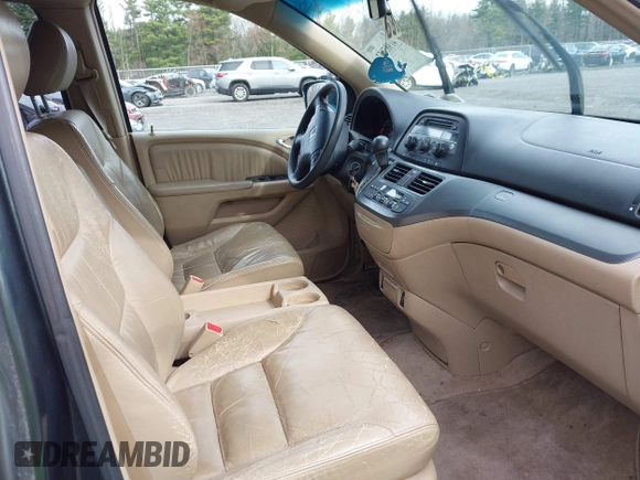 2005 Honda Odyssey EX-L with VIN 5FNRL38645B008281, listed as a IAAI auction lot 41985052 with 219,693 mi miles. Bid and sale history available at carsss.com. Image 5.
