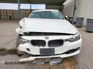 2013 BMW 3 Series 328i xDrive with VIN WBA3B3C51DF540084, listed as a Copart auction lot 56930105 with 117,567 mi miles and Salvage title. Bid and sale history available at DreamBid. Image 5.