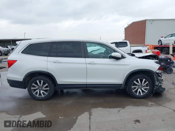 2021 Honda Pilot EX-L with VIN 5FNYF6H55MB031305, listed as a IAAI auction lot 41476636 with 58,754 mi miles. Bid and sale history available at carsss.com. Image 14.