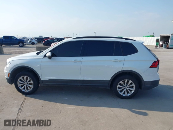 2018 Volkswagen Tiguan S with VIN 3VV1B7AX1JM119971, listed as a IAAI auction lot 42039977 with 108,932 mi miles and . Bid and sale history available at DreamBid. Image 14.