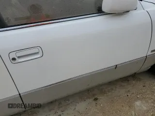 2000 Lexus LS 400 z VIN JT8BH28FXY0178613, wystawiony jako Copart lot #74883444 z przebiegiem Nie podano mil oraz Szkody całkowita. Historia ofert i sprzedaży dostępna na DreamBid. Obrazek 12.