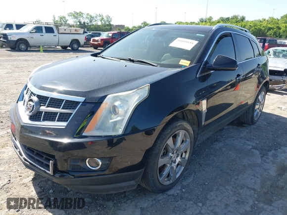 2012 Cadillac SRX Performance Collection with VIN 3GYFNBE39CS656702, listed as a IAAI auction lot 39599535 with 110,860 mi miles and . Bid and sale history available at DreamBid. Image 2.