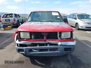 2000 Nissan Frontier XE z VIN 1N6DD21SXYC366427, wystawiony jako IAAI lot #42111404 z przebiegiem 176 579 mil mil oraz . Historia ofert i sprzedaży dostępna na DreamBid. Obrazek 6.
