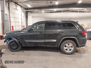 2011 Jeep Grand Cherokee 70th Anniversary with VIN 1J4RR4GG3BC745652, listed as a IAAI auction lot 41133698 with 217,948 mi miles. Bid and sale history available at carsss.com. Image 14.